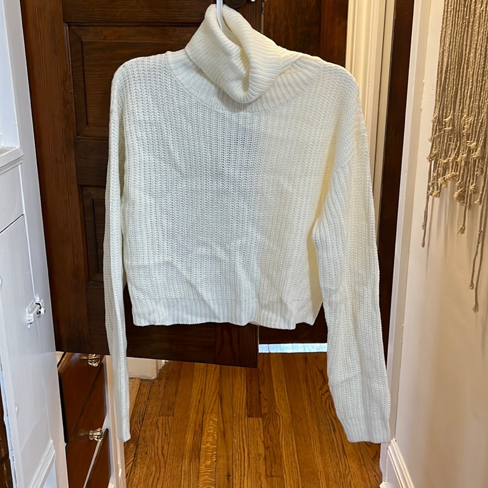 Cropped white knit turtle neck from Nasty Gal
